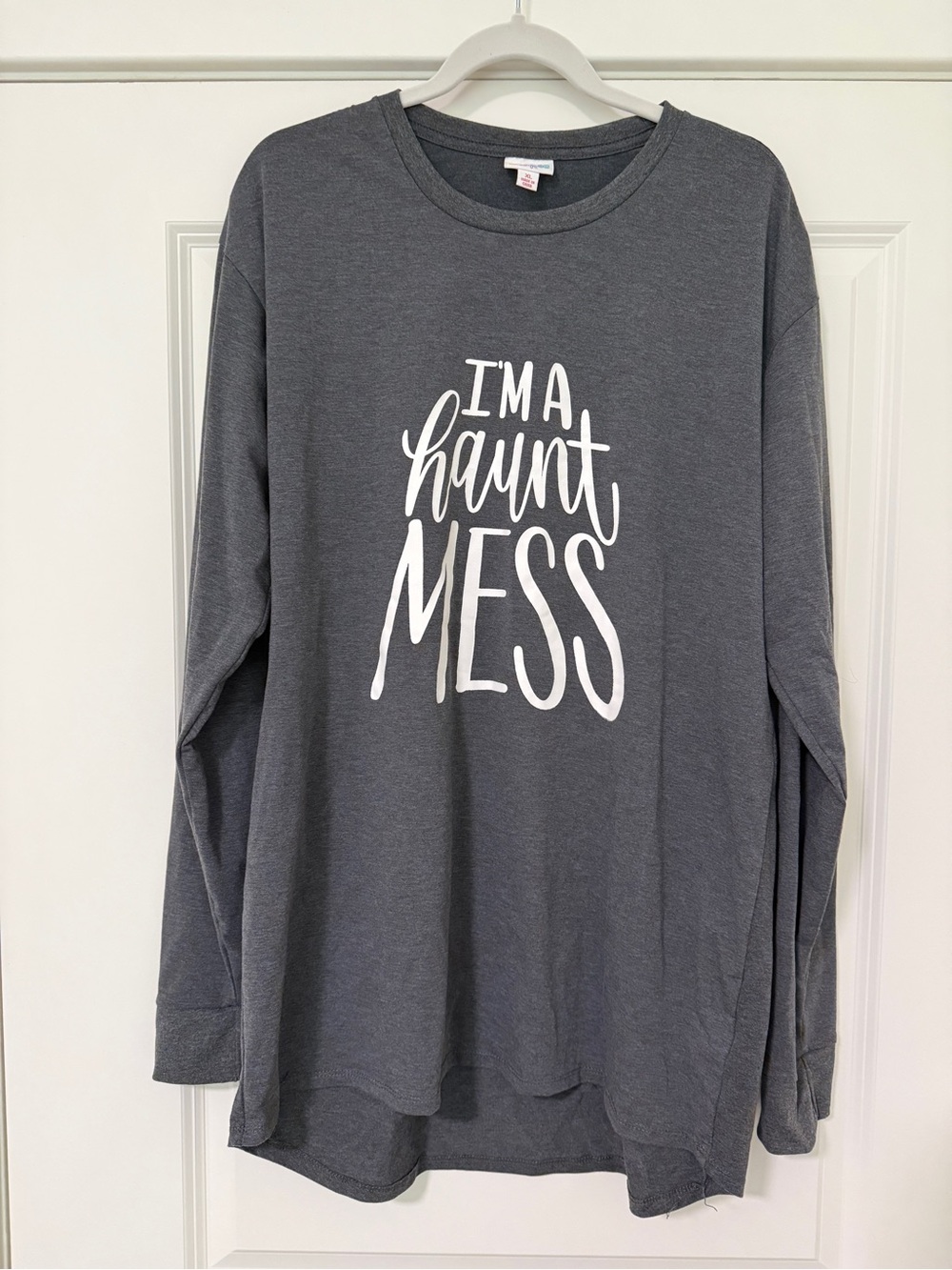 LuLaRoe Hudson XL Gray Long Sleeve Tee with White 'I'm a Haunt Mess' Graphic.